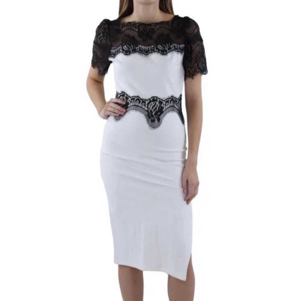 Elegant White Dress with Black Lace Detail